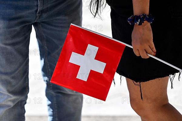 Swiss flags man and woman