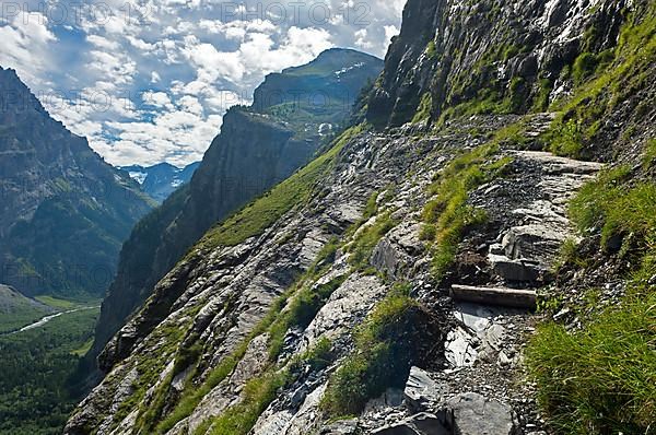 Exposed hiking trail to the Balmhorn Hut above Gasterntal