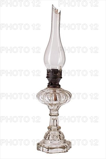 Old oil lamp on an isolated studio background