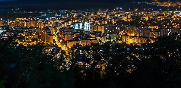 Targu Mures city night time background seen from a high place