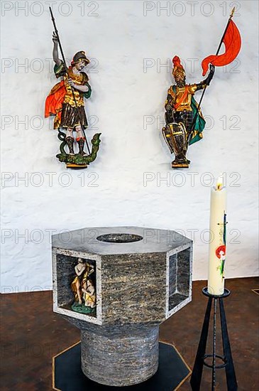 Baptismal font and Archangel Michael the Dragonslayer