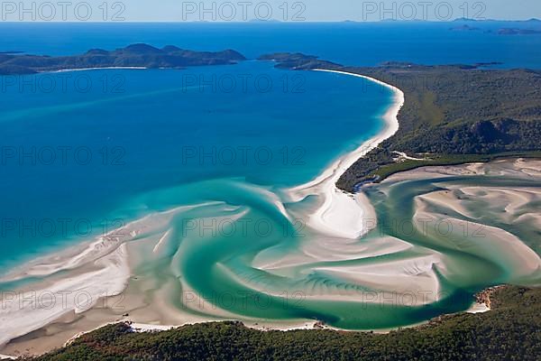 Area view of white sandy beaches and turquoise waters of Whitehaven Beach on Whitsunday Island in the Coral Sea