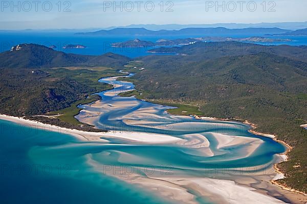 Area view of white sandy beaches and turquoise waters of Whitehaven Beach on Whitsunday Island in the Coral Sea