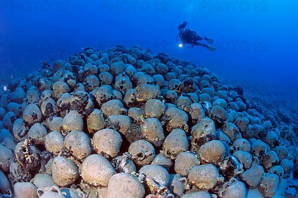 Diver with amphorae