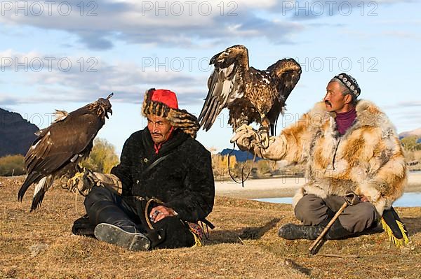 Kazakh hunters with Golden Eagles