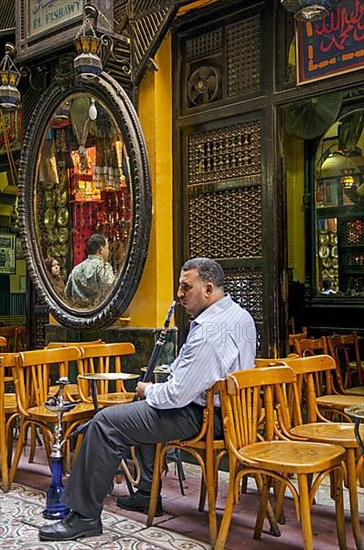 Man smoking in cairo cafe in egypt