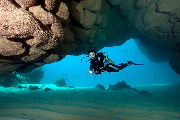 Divers in underwater cave off Punta Cana