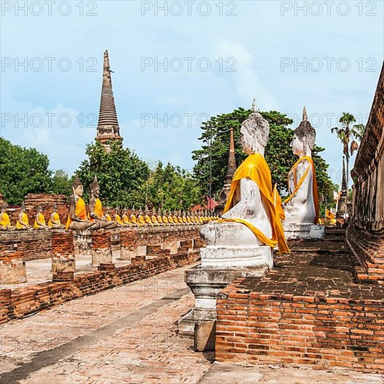 Buddha statues around the central stupa