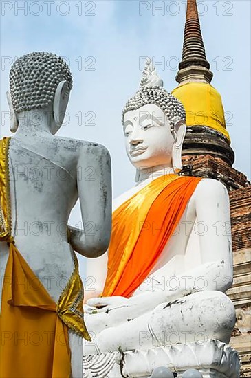 Buddha statues in front of the stupa in Wat Yai Chai Mongkhon