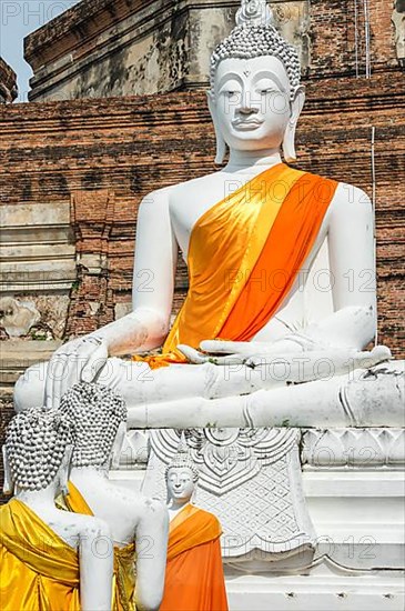 Buddha statues in front of the stupa in Wat Yai Chai Mongkhon