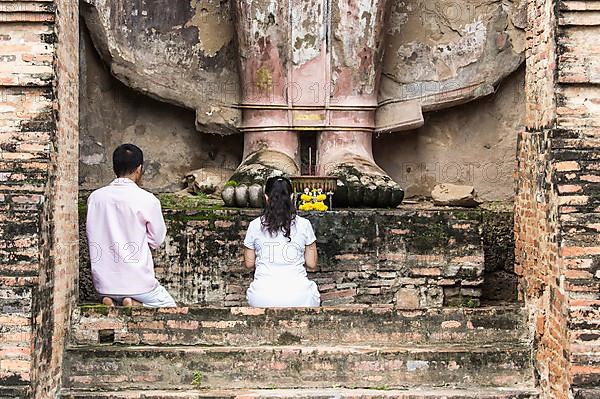 Praying worshippers