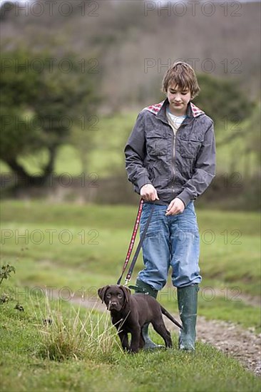 Boy with Labrador Retriever
