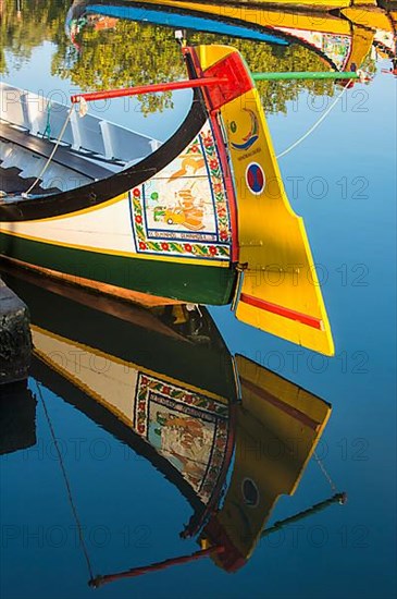 Colourful hand-painted stern of a gondola like Moliceiro