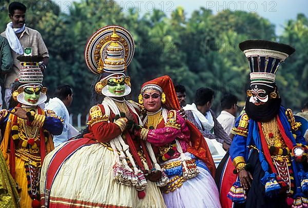 Kathakali dancers in Aranmula boat race procession during Onam Celebrations