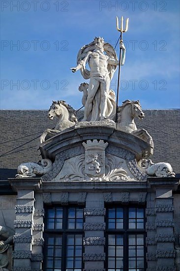 Statue of the Roman god Neptune with trident above the entrance to the Old Fish Market