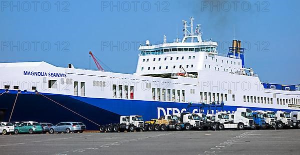 Trucks and cars from the Volvo assembly plant waiting to be loaded onto the roll-on/roll-off/roo-ship in the seaport of Ghent