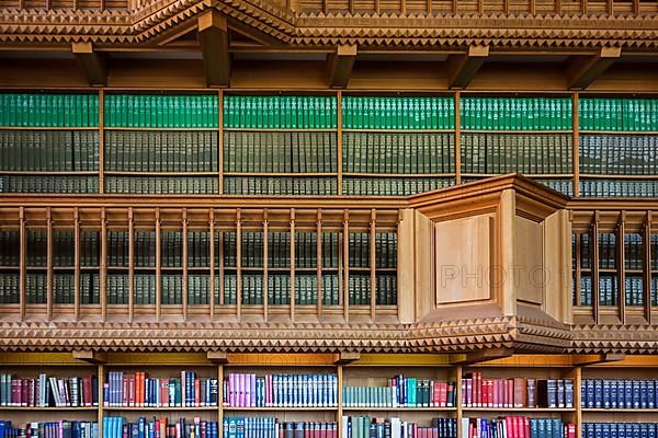 Interior with large bookshelves with book collections in the University Library of Leuven