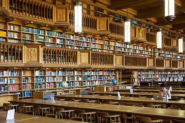 Interior with large bookshelves with book collections in the University Library of Leuven