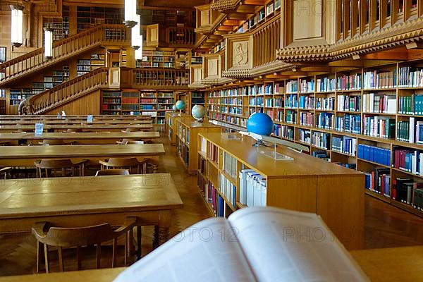 Interior with large bookshelves with book collections in the University Library of Leuven