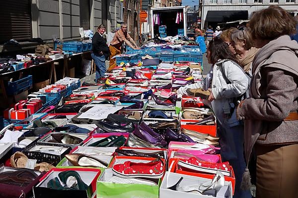 Used shoes for sale at the flea market on St. Jacobs Square in Ghent