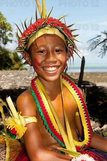 Boy decorated for traditional bamboo dance