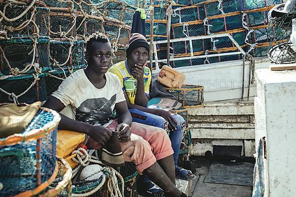 Fishermen on their boat