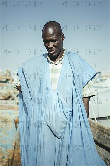 Fisherman Kabir Sidi M'Barek on his boat