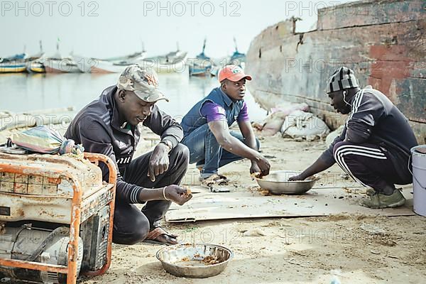 Fishermen having lunch