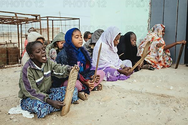 Children in the early morning at the Koran school