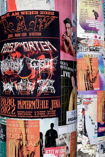 Posters on advertising pillar