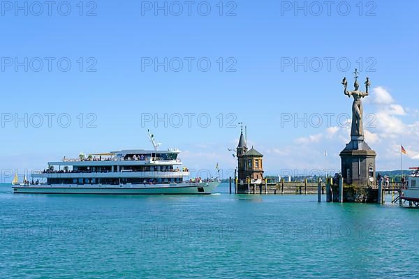 Excursion boat in front of the harbour entrance