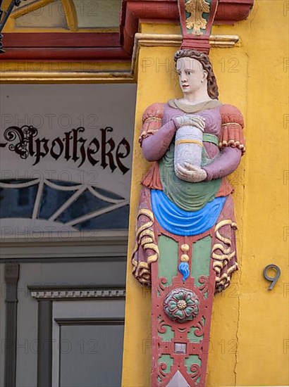 Female herm with apothecary vessel on the portal of the Alte Raths-Apotheke from 1598