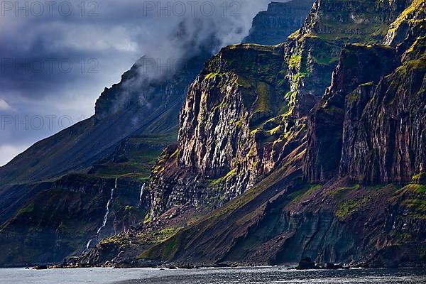 Steep coast at the fjord Seydisfjoerdur