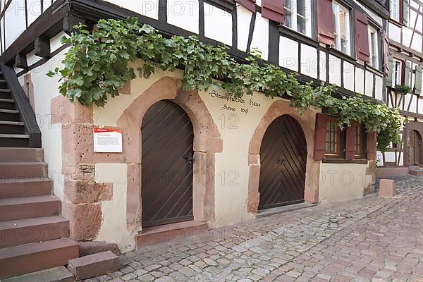 House wall of the half-timbered house Strumpfweberhaus in Schenkenzeller Strasse in Schiltach