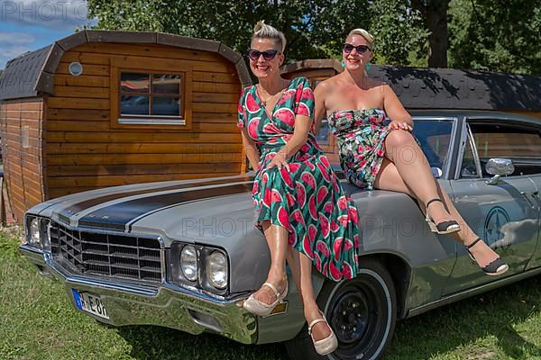 American vintage Buick with two woman