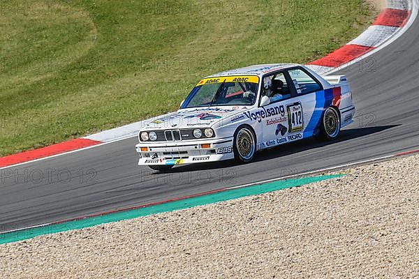 Historic race car BMW M3 at car racing for classic cars Youngtimer Classic Cars 24-hour race 24h race