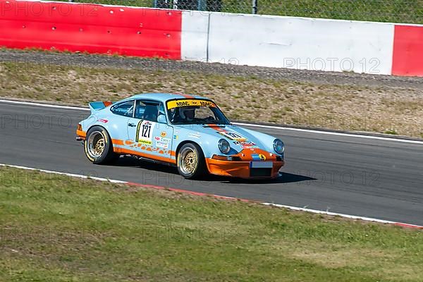 Historic racing car Porsche 911 RSR at car racing for classic cars youngtimer classic cars 24-hour race 24h race