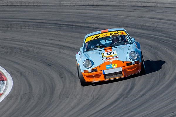 Historic racing car Porsche 911 RSR at car racing for classic cars youngtimer classic cars 24-hour race 24h race