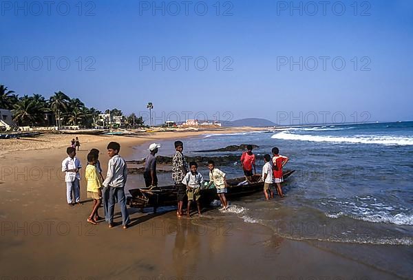 Children playing Rushikonda Beach Bay of Bengal at Visakhapatnam Vizag