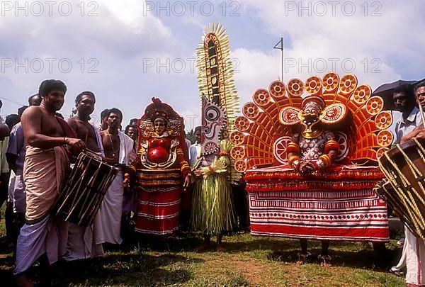 Theyyam dancers in Atham Athachamayam celebration in Thripunithura during Onam near Ernakulam