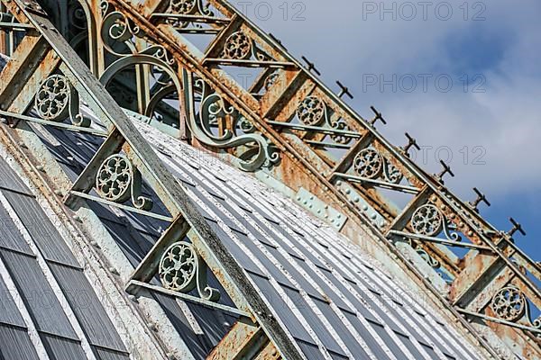 Detail of the ornate wrought-iron roof truss of the Royal Greenhouses of Laeken in Art Nouveau style