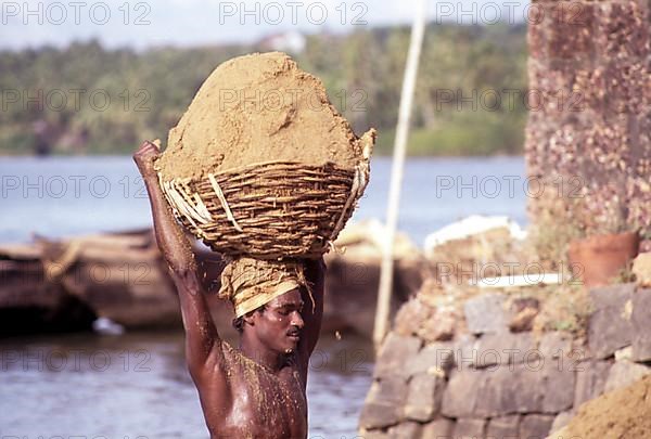 Collecting sand from Gurpura River near Sultan Battery