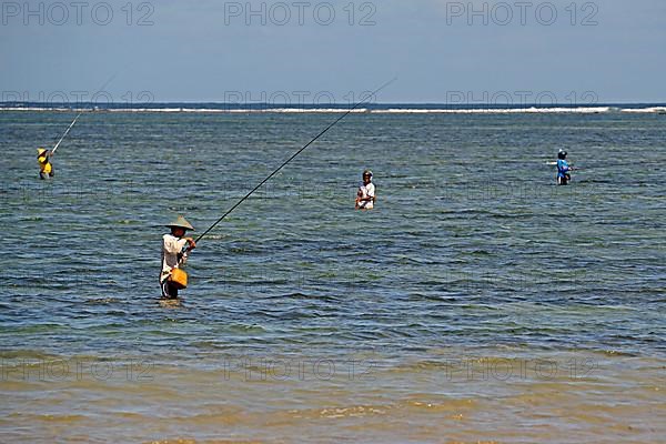 Anglers on the beach of Sanur