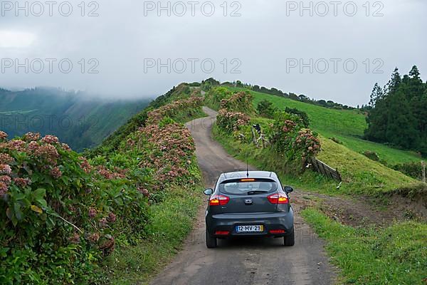 Car on the edge of the crater