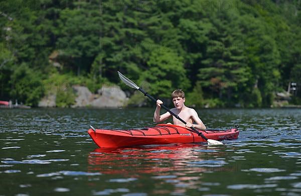 Boy in a canoe