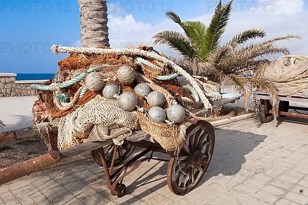 Fishing net on wooden cart