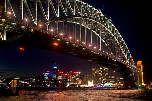 Sydney Harbour Bridge and view of the city skyline at night