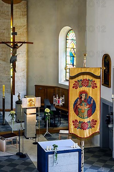 Main altar with tabernacle and flag