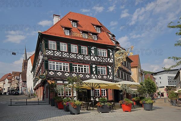 Half-timbered house Alte Post Restaurant and Hotel with nose sign in Nagold in Alte Post