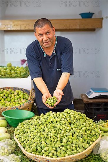 Moroccan man with okra